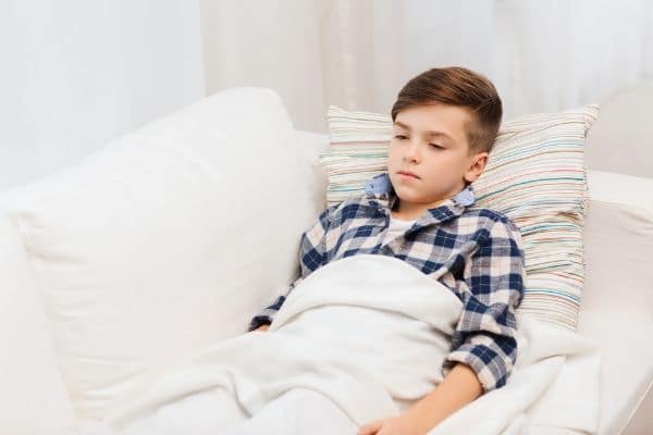 A young child home sick with a cold